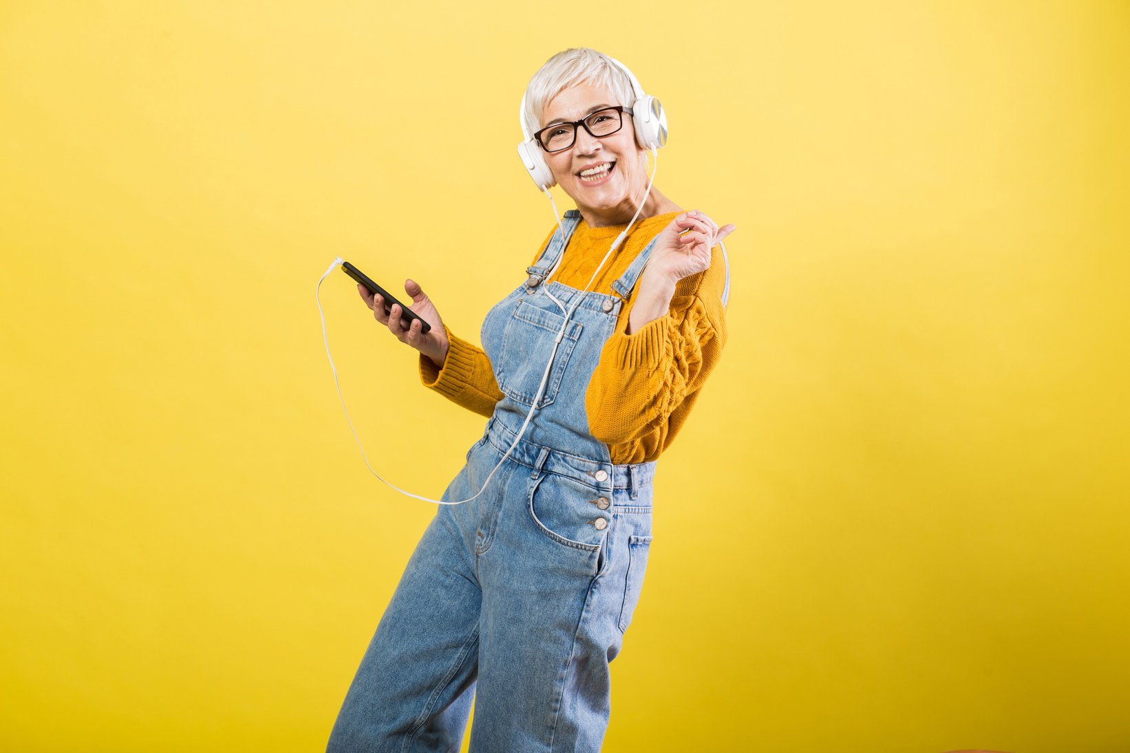 Older woman listening the music